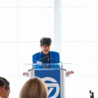 President Philomena Mantella speaking at podium